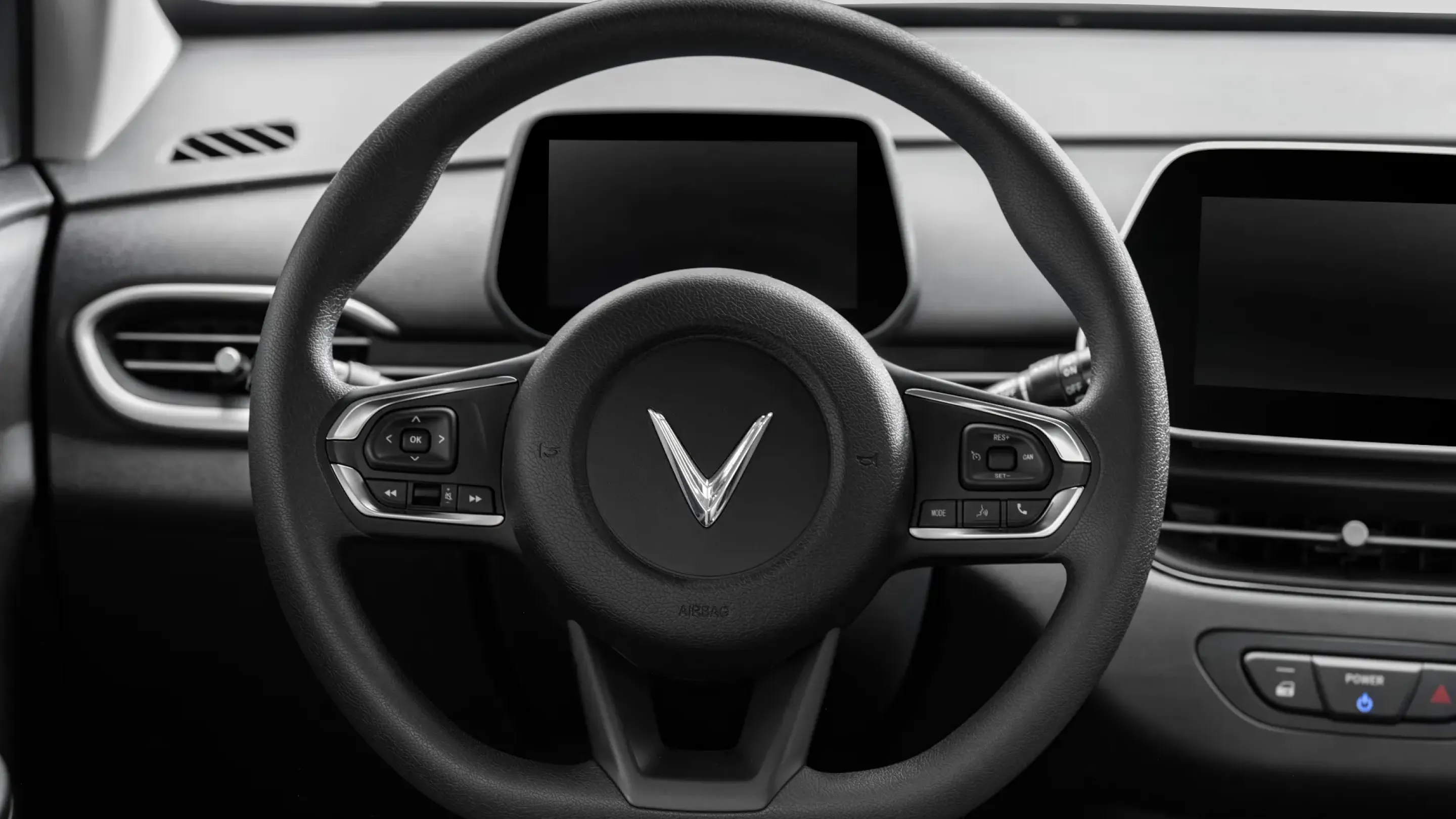 VinFast VF 5 — Steering wheel, with audio and cruise controls